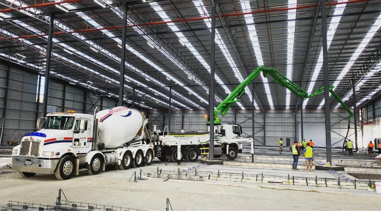 A large industrial floor pour fed by an HVCPS boom pump