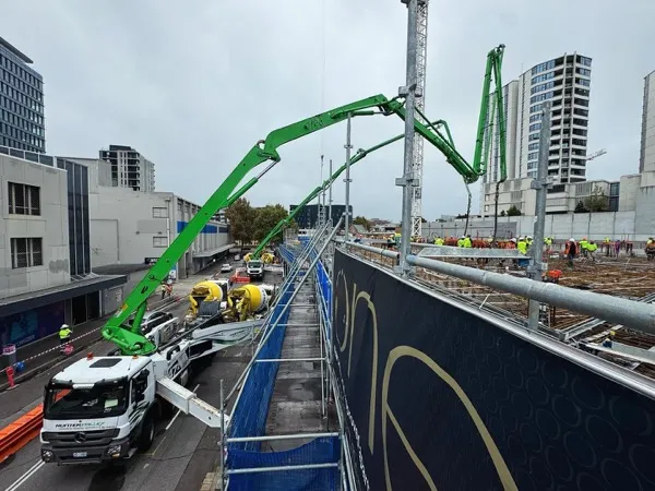 Boom working a high-rise deck pour