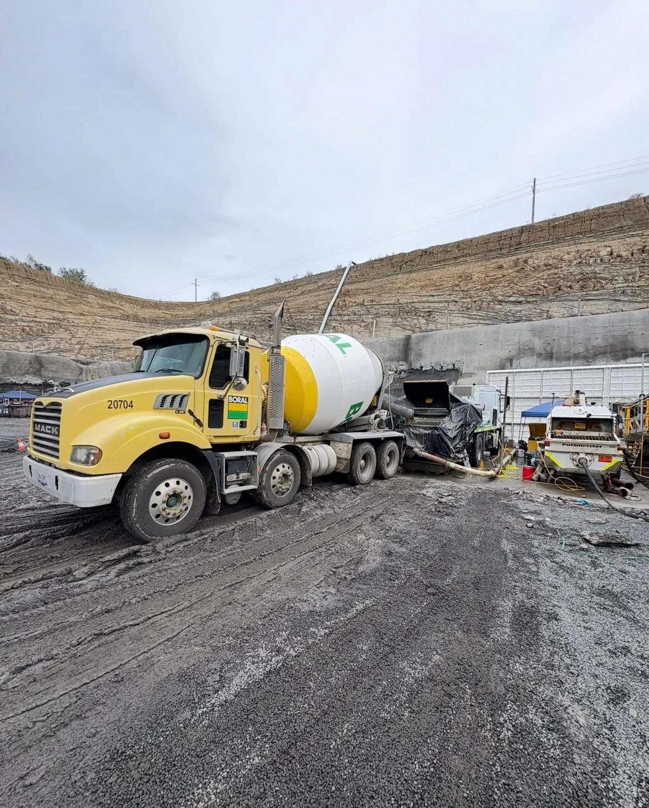Agitator trucks feeding the pump at the mine surface